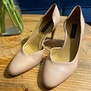 Nude stylish high heels.